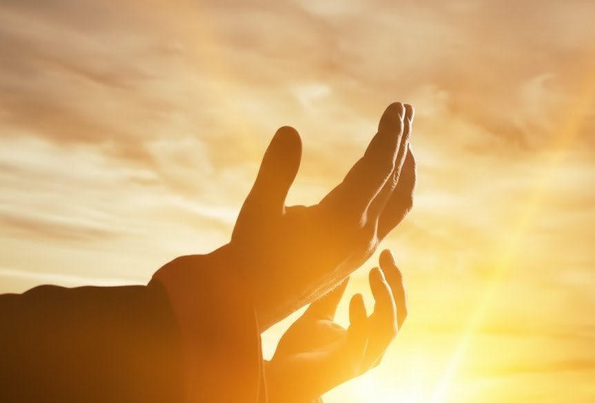 Raising hands for prayer